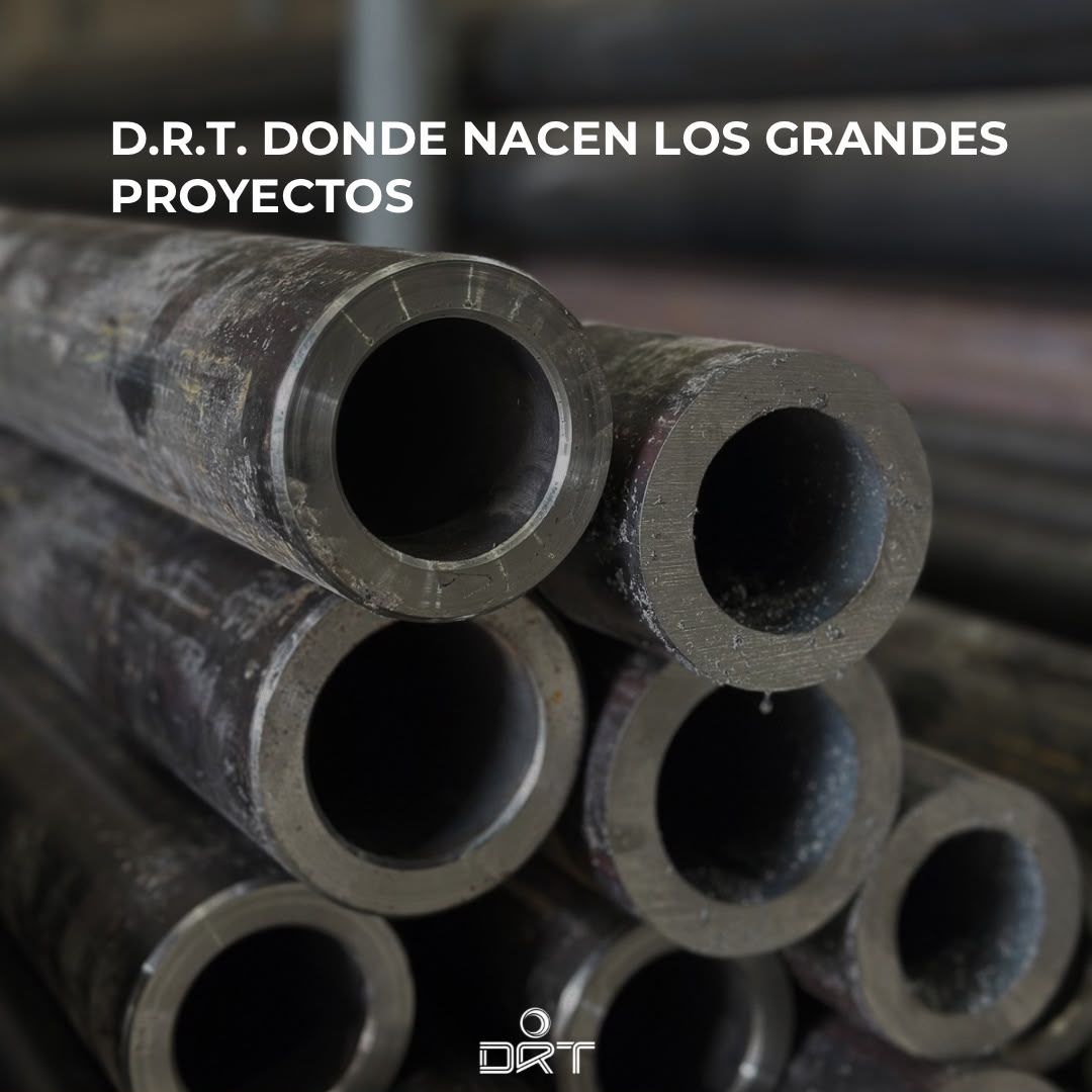Tubos de pared gruesa en primer plano con el texto "D.R.T. donde nacen los grandes proyectos".